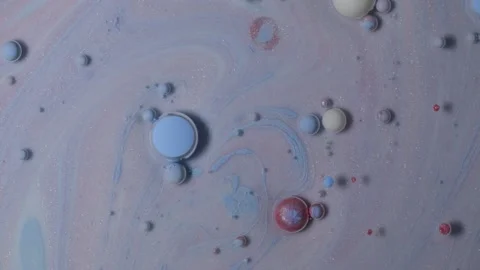 Abstract background of colorful bubbles. Chaotic movement ink in water. Stock Footage 169718713