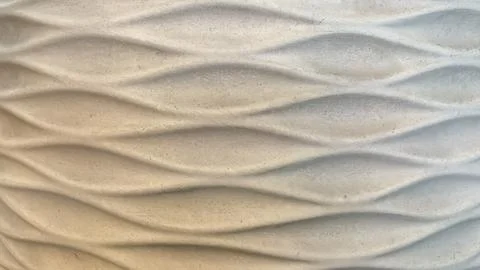 Abstract background of a concrete surface with elegant wavy geometric relie.. Foto stock