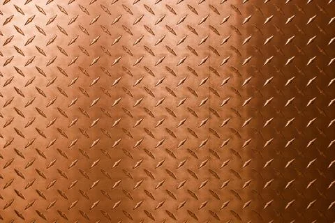 Abstract background of copper texture with a diamond pattern. Stock Photos