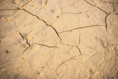 Abstract background of cracked earth Fotos Stock