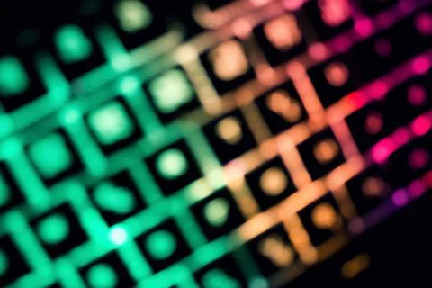 Abstract background created by blur glowing keyboard. Stock Photos