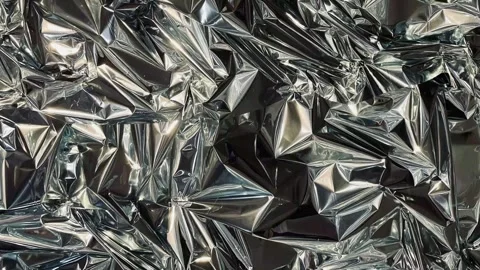 Abstract background of crumpled silver foil texture, animated background Video stock 333977547