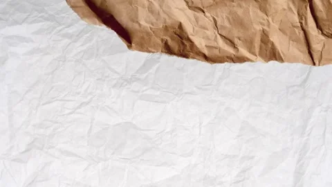 Abstract Background of Crumpled White Paper with Moving Brown Paper Vidéo 333350091