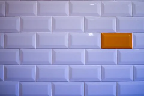 Abstract Background dark pattern white and orange bricks Stock Photos