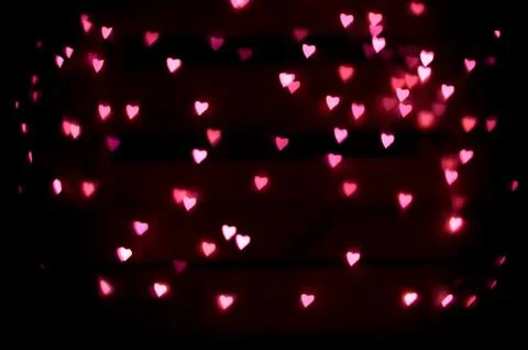 Abstract background of defocused heart-shape bokeh Stock Photos