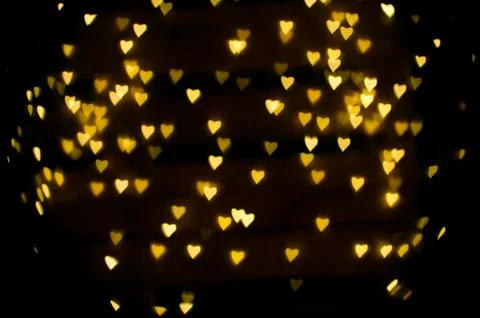 Abstract background of defocused heart-shape bokeh Stock Photos