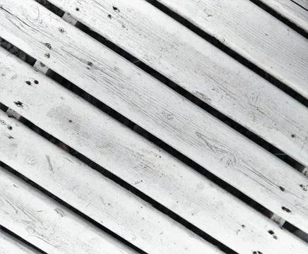 Abstract background diagonal white painted boards, slats nailed in the distan Stock Photos