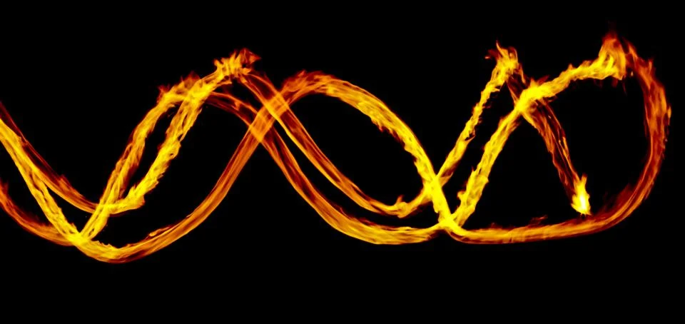 An Abstract background of double infinity fire flame sign isolated on a black 스톡 일러스트