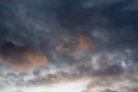 Abstract background of dramatic sky with dark gray clouds and rain clouds Stock Photos