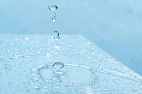 Abstract background. Drops of water on the window. water pours on a piece of Stock Photos