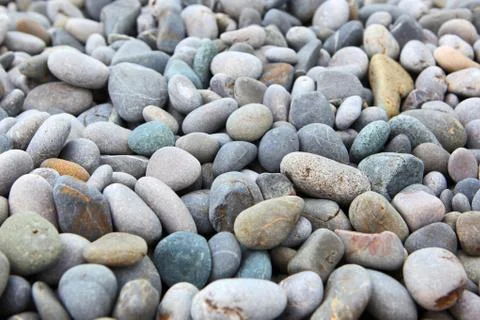Abstract background with dry round peble stones Stock Photos