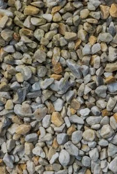 Abstract background with dry round reeble stones Stock Photos
