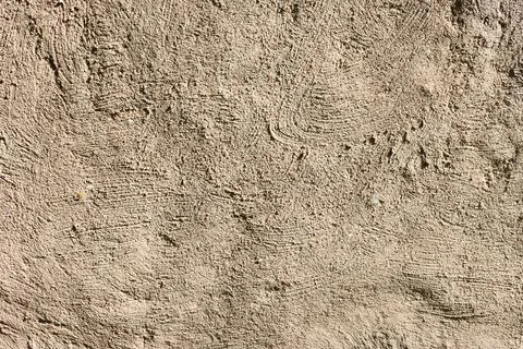 Abstract background of embossed rough wall surface. Stock Photos