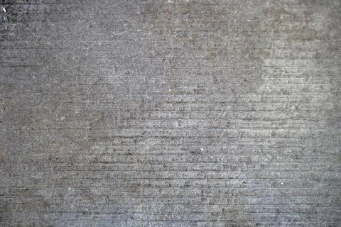 Abstract background. Empty surface of gray concrete with scratches. Fotos de archivo