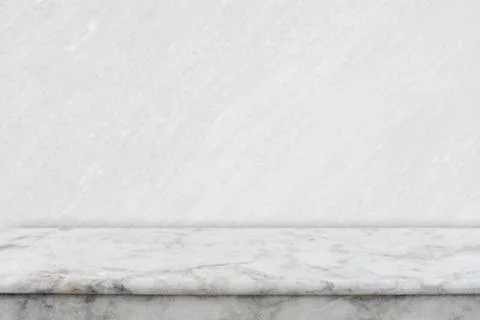 Abstract background from empty white marble table top for showing product adv Stock Photos
