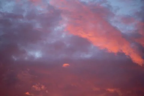 Abstract background of evening sky with clouds. Stock Photos