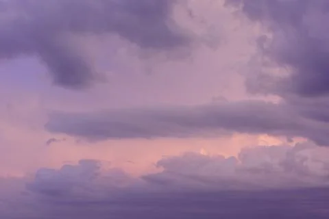 Abstract background of evening sky with rain clouds. Stock Photos
