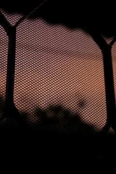 Abstract background featuring a bright, warm-colored sunset filtered Stock Photos