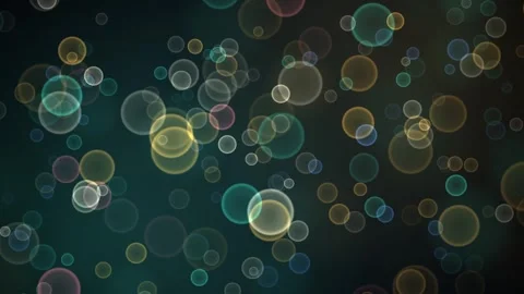 Abstract background featuring colorful glowing circular bokeh light effects.. Stock Footage 346723462