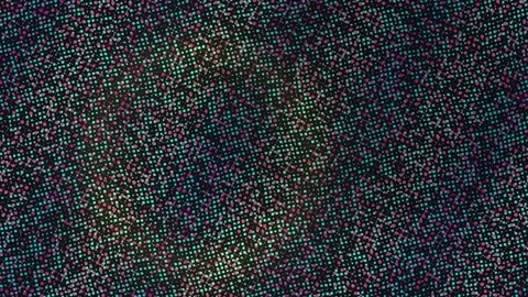 Abstract background featuring a dense pattern of small multi-colored dots a.. Stock Footage 347244045