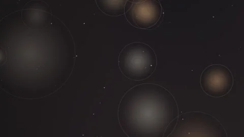 Abstract background featuring glowing golden circles floating across dark s.. Видео 341285741