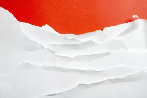 Abstract background featuring layers of torn white paper with ripped edges .. Stock Photos