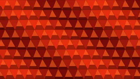 Abstract background featuring a repeating pattern of geometric red triangle.. Stock Footage 347464917