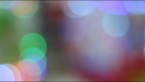 Abstract background featuring soft and cheerful colorful bokeh light effects. Stock Footage 332866282