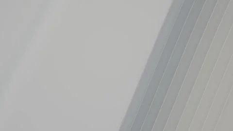 Abstract background featuring soft grey paper layers with diagonal stripes .. Stock-Footage 347465285