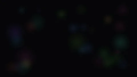 Abstract background featuring soft multicolored light bokeh on black backdrop Stock Footage 335117352