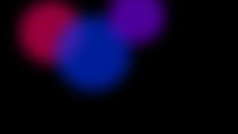 Abstract background featuring soft red and purple glowing light circles 库存影片 335149915