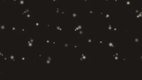 Abstract background featuring soft white glowing particles on black field Video stock 336263348