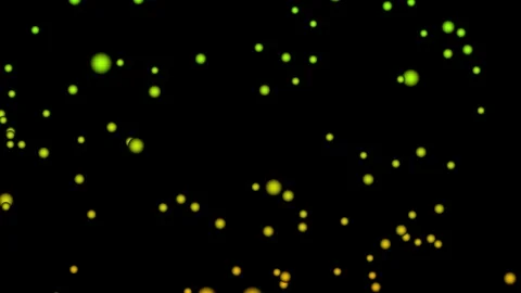 Abstract background featuring vibrant green and yellow particles drifting t.. 库存影片 333978030
