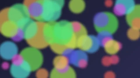 Abstract background featuring vibrant multicolored bokeh circles on dark Stock Footage 335146022