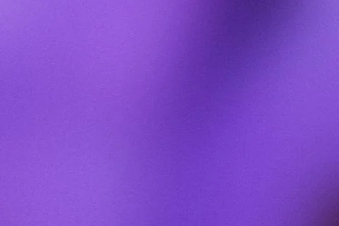 Abstract background featuring a vibrant purple hue with subtle grunge texture Stock Photos
