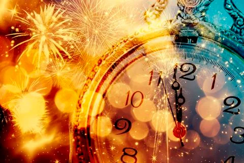 Abstract background with fireworks and clock close to midnight 库存照片