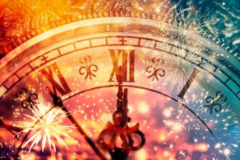Abstract background with fireworks and clock close to midnight Stock Photos
