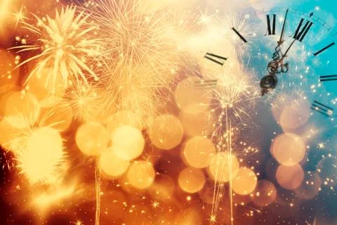 Abstract background with fireworks and clock close to midnight 库存照片