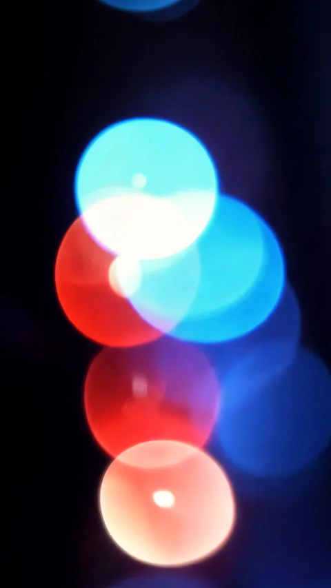 Abstract background with flashing red and blue lights. Vertical video. Stock Footage 310310231
