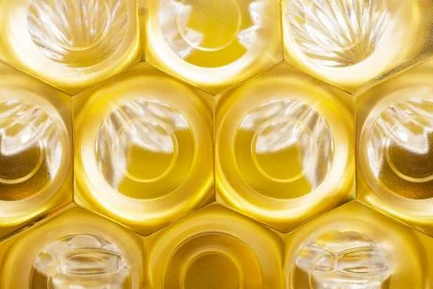 Abstract background in the form of hexagons and circles in gold color with a  Stock Photos