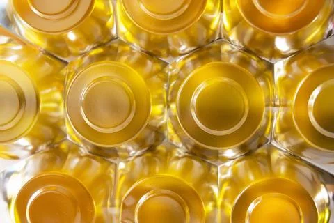 Abstract background in the form of hexagons and circles in gold color with a  Stock Photos