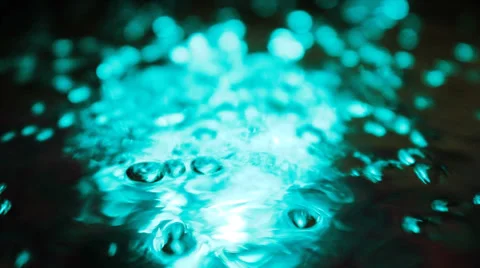 Abstract background of frenzied bubbles backlit by different colored lights Stock Footage 36648449