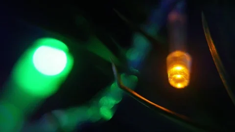 Abstract background of garland orange and green lights on the Christmas tree, Video stock 101063722