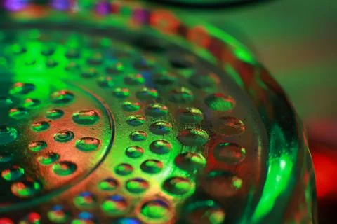 Abstract background of a glass jar with a pattern of green and red lights Stock Photos