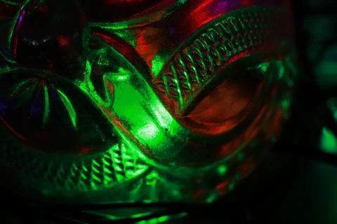 Abstract background of a glass jar with a pattern of green and red lights Stock Photos