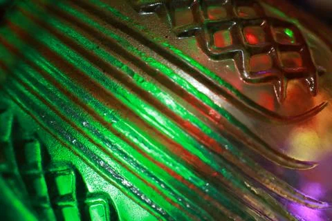 Abstract background of a glass jar with a pattern of green and red lights Stock Photos