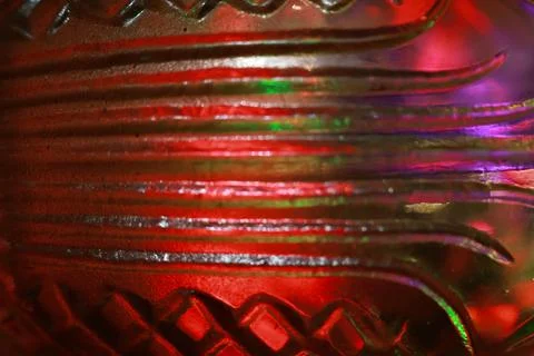 Abstract background of a glass jar with a pattern of green and red lights Stock Photos