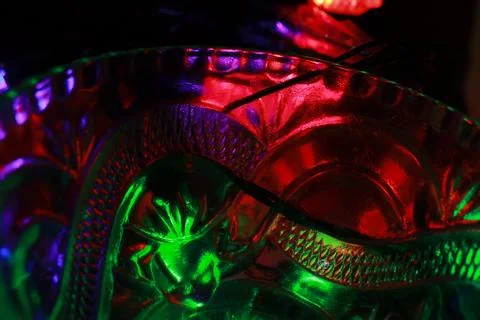 Abstract background of a glass jar with a pattern of green and red lights Stock Photos