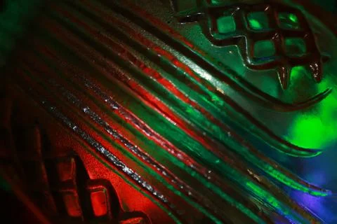 Abstract background of a glass jar with a pattern of green and red lights Stock Photos