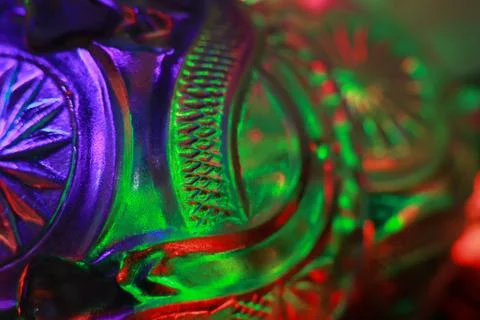 Abstract background of a glass jar with a pattern of green and blue lights Stock Photos